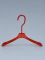 JY07 Clear Acrylic Women's Hanger with Clips — angled view